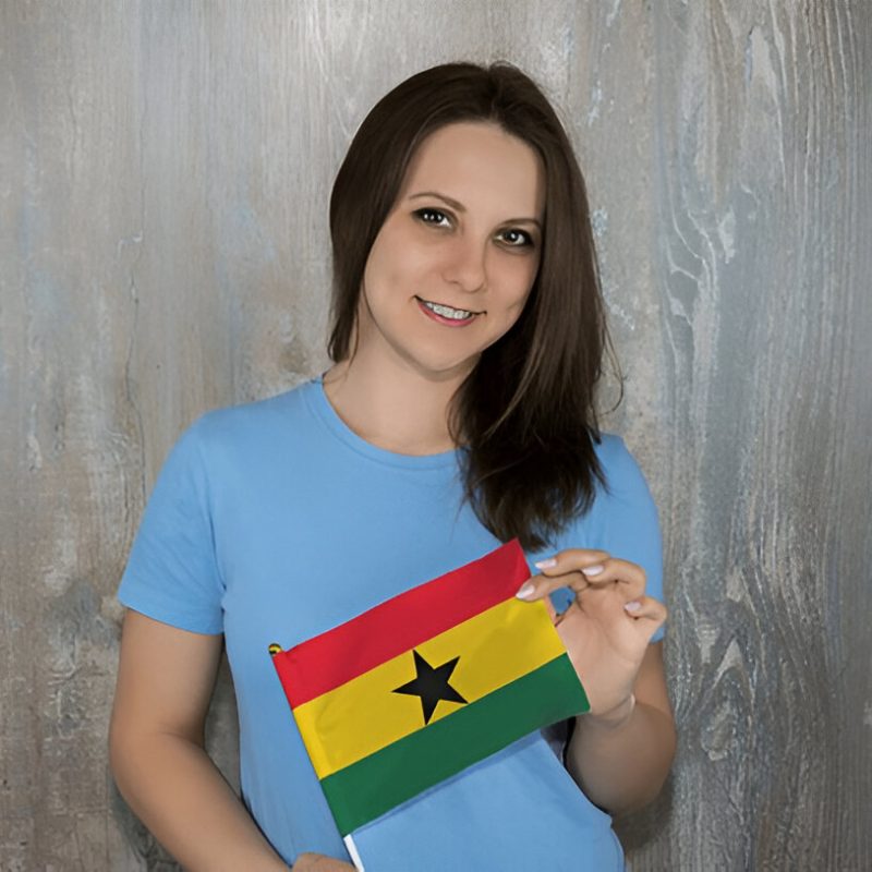 young-smiling-woman-ghana-flag-her